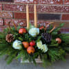 Shown as Standard
Mixed evergreens, roses, spray roses, pine cones, candles and ornaments