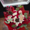 A beautiful and delicate bouquet in a special Christmas arrangement that will