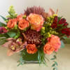 A lovely arrangement to give thanks with family and friends. 
Roses, chrysanthemums