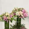 This is a lovely arrangement that comes in two sizes. A beautiful