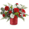 Teleflora&#039;s Christmas Magic Bouquet sparkles with red and green blooms, festive evergreens
