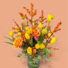 Roses, Spray roses, Tulips with autumn branches, greenery in a clear vase.