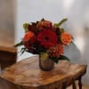 Celebrate Fall with this beautiful arrangement in seasonal flowers lovingly designed in