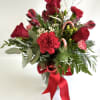 This bouquet arranged with all red Roses, Alstroemeria and Carnations with candy
