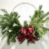 This beautiful wreath is created on a gold or silver ring, with