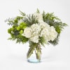 Celebrate the season with the Winter Bliss Flower Bouquet, a stunning monochromatic