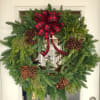 Send holiday cheer near and far with this fresh evergreen wreath. 