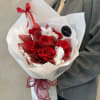 Crimson Forever Bouquet is a timeless blend of deep red preserved roses