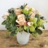 The color theme for this arrangement is rustic, rich in warm earth