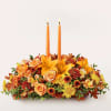 Add instant fall charm to any space with this handcrafted candle centerpiece.