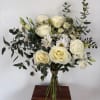 A mix of designer&rsquo;s choice white blooms to include premium stems of