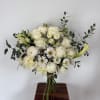 A mix of designer&rsquo;s choice white blooms to include premium stems of
