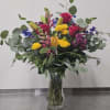Get the wildflower look including a variety of eucalyptus.  Delphinium, roses