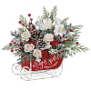 This cute Christmas bouquet of snow white roses and flocked greens becomes