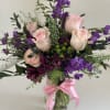 This gorgeous arrangement if perfect for someone with grace and beauty. Pinks
