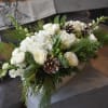 Blend of white hydrangeas, delicate white roses, fragrant white stock, white iris