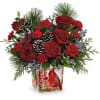 Paint a magical holiday scene with this classic Christmas bouquet, arranged in