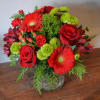 Shades of red with pops of vibrant green designed in a cylinder