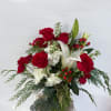 A Festive Bouquet of Seasonal Beauty
Celebrate the holiday season with our Holiday
