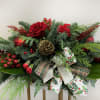Add timeless elegance to your holiday celebrations with our Classic Christmas Centerpiece.