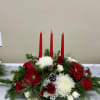 Christmas greens with red and white flowers 