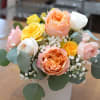 Soft, romantic, and effortlessly elegant, this arrangement combines the timeless beauty of
