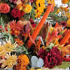 A Bountiful array of fall blooms designed to the festivities of the