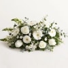 Soft, soothing, and beautifully composed, this all- white arrangement offers a gentle