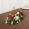 This classic holiday centerpiece brings the warm magic of Christmas to any