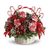 A 8.5&quot; white basket with candy cane style handle is filled with