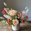 This arrangement is sweet and contemporary and perfect for any occasion. Welcome
