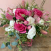 Stun your better half with this delightful, chic, pink and white flower