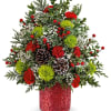 Teleflora&#039;s Holiday Cheer Tree is brimming with joy! Red carnations, green mums