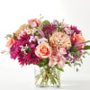 A Cranberry flavored fresh flower arrangement with white or pink roses and