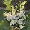 An Elegant Tall Arrangement with Evergreens, White Flowers, Silver Birch, and Gold