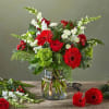A bouquet with fresh red, green, and white stems including Gerbers, Hydrangeas