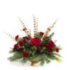 Rich, velvety red roses and miniature spray roses create a luxurious focal