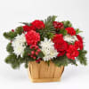 Good Tidings Floral Basket with vibrant blooms and fresh accents of holiday