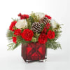 An aromatic experiece, the Christmas Market Bouquet includes assorted seasonal greens to