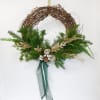 A modern, airy twist on the classic Christmas wreath &mdash; designed on