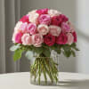 A timeless bouquet of 24 different shades of pink roses, gathered in
