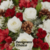 This designers choice will be made with seasonal wintergreens and seasonal flowers.