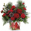 Paint a magical holiday scene with this classic Christmas bouquet, arranged in