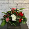 A beautiful arrangement, perfect for any Christmas celebration!