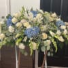 casket spray in blue and white