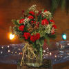 A fresh holiday bouquet with a natural, vintage feel. Pops of babies