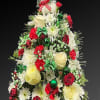 EC Holiday Cheer Tree is brimming with joy! Red carnations, green mums