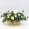 Blue Christmas is a luxurious centerpiece with beautiful Blue Thistle, White Roses