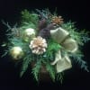 Make the season bright with gold tones.
Long lasting assortment of evergreens, cones