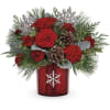 Capture the magic of the holidays with this joyful Christmas bouquet of